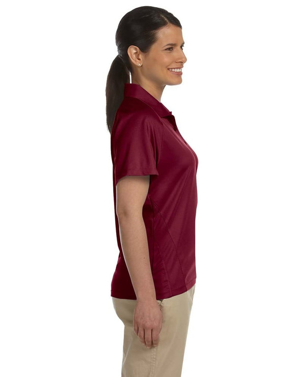 Harriton M374W - Damas 3.8 oz. Polo con inserciones de malla Polytech