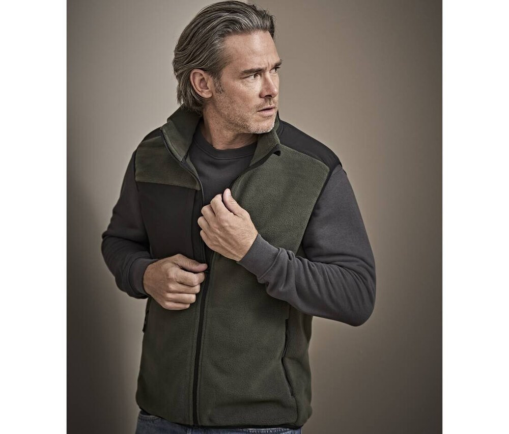 Tee Jays TJ9122 - Raskas polyesteri bodywarmer vahvistetuilla paneeleilla