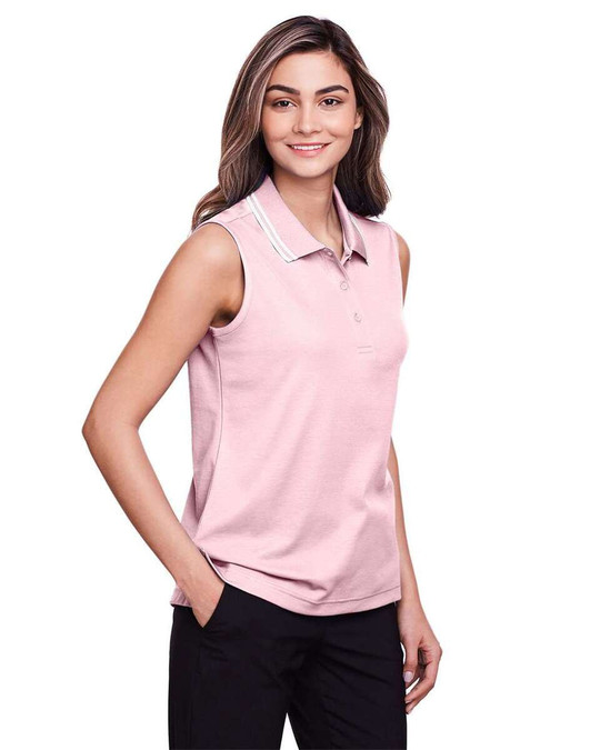 Devon & Jones DG20SW - CrownLux Performance® Polo sin mangas con ribete trenzado para damas