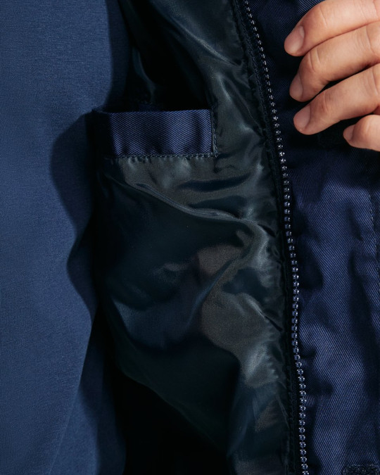 Roly CQ8414 - ARMADA Padded multi-pocket work vest with extended back