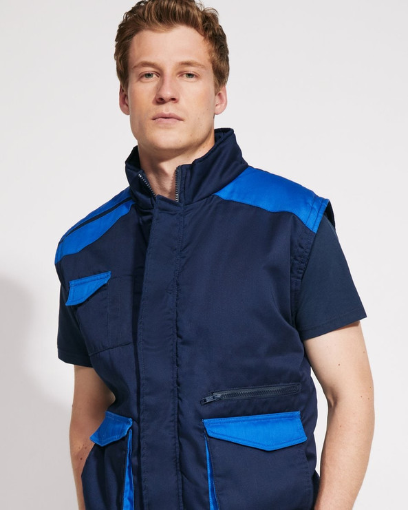 Roly CQ8414 - ARMADA Veste de travail rembourrée multi-poches avec dos long