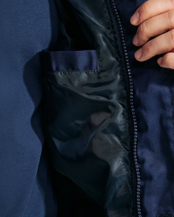 Roly CQ8414 - ARMADA Padded multi-pocket work vest with extended back