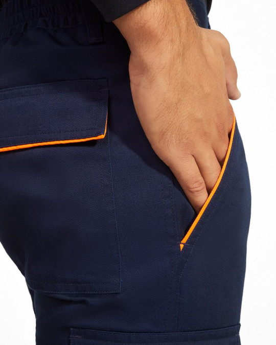 Roly HV9321 - ENIX Tweekleurige lange broek met hoge zichtbaarheid en meerdere zakken