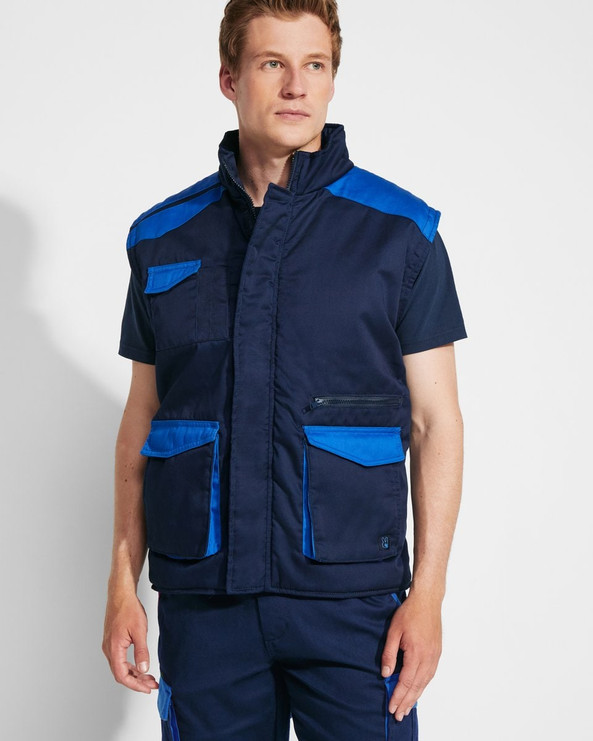 Roly CQ8414 - ARMADA Padded multi-pocket work vest with extended back