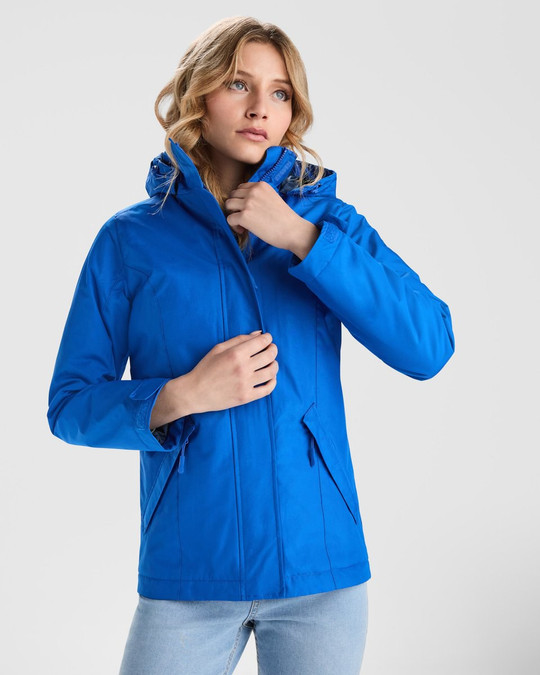 Roly PK5073 - AMERICA WOMAN Padded parka jacket with removable hood and elastic adjusters