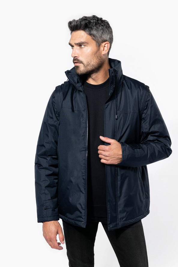 Kariban K693 - FACTORY > ROBUSTE ARBEITSJACKE MIT ABNEHMBAREN ÄRMELN