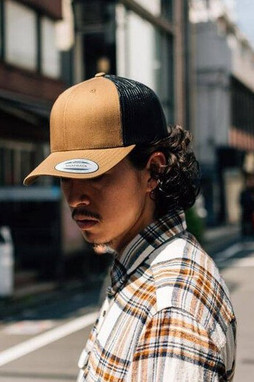 Flexfit F6606T - Breathable Flexfit Trucker Cap with Reinforced Front